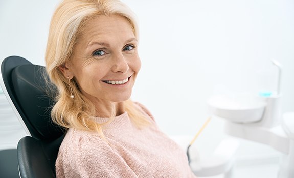 Woman smiling in the dental chair