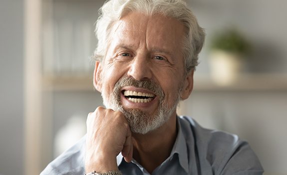 Man smiling with dentures