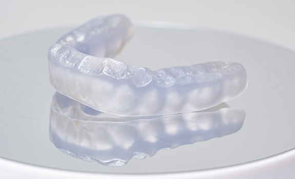 Occlusal splint sitting on reflective surface